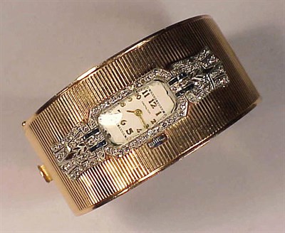 Lot 279 - Gold and Diamond Bangle Wristwatch The 14 kt....