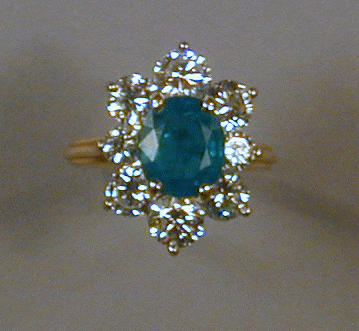 Lot 493 - Emerald and Diamond Ring The 18 kt. yellow...