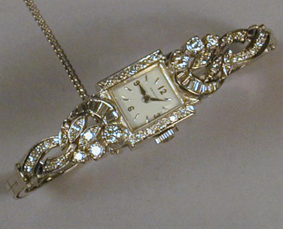 Lot 332 - Lady's Diamond Wristwatch 14 kt. white gold,...