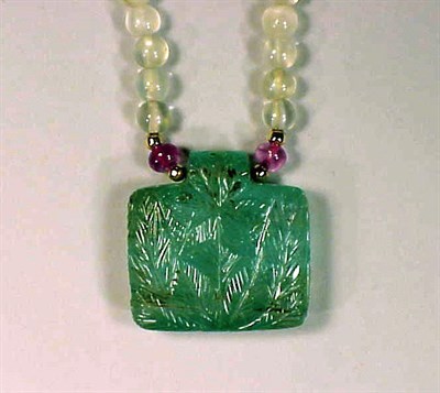 Lot 263 - Moonstone and Carved Emerald Necklace The...