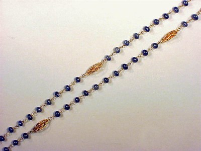 Lot 200 - Sapphire Bead and Gold Necklace 14 kt. yellow...