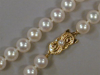 Lot 524 - Cultured Pearl Necklace and Pair of Earrings...
