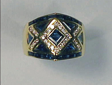Lot 421 - Diamond and Sapphire Ring 18 kt. yellow gold,...