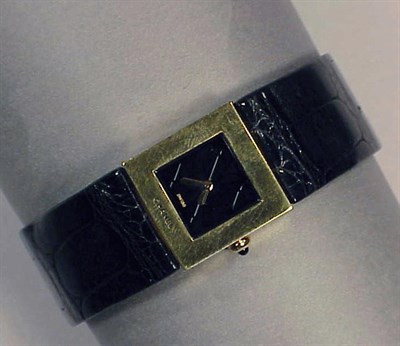 Lot 429 - Lady's Gold Wristwatch The black leather...