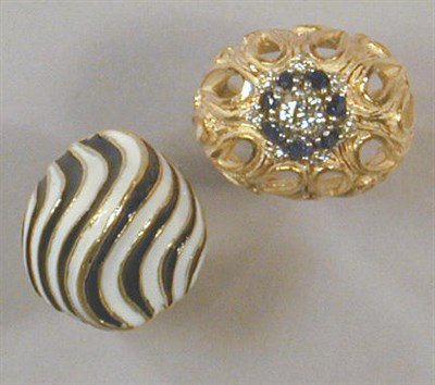 Lot 127 - Two Gold Rings 18 kt. yellow gold, comprising...