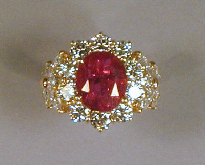 Lot 527 - Ruby and Diamond Ring 18 kt. yellow gold, set...