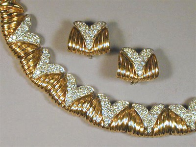 Lot 452 - Suite of Gold and Diamond Jewelry 18 kt....