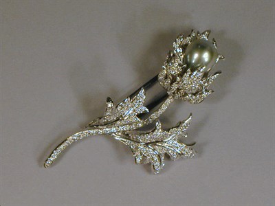 Lot 492 - Diamond and Cultured Pearl Thistle Pin 14 kt....