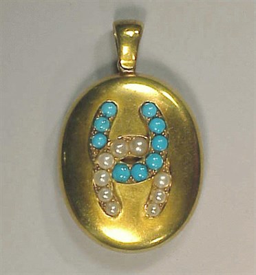 Lot 250 - Antique Gold and Turquoise Locket 18 kt....