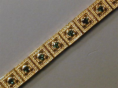 Lot 87 - Gold and Green Tourmaline Bracelet 14 kt....