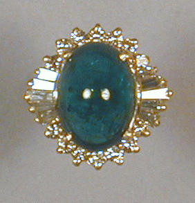 Lot 449 - Cabochon Emerald and Diamond Ring 18 kt....