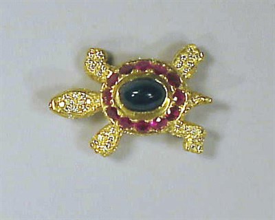 Lot 143 - Diamond, Ruby and Sapphire Turtle Pin 18 kt....