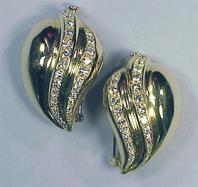Lot 144 - Pair of Gold and Diamond Dress Clips 18 kt....