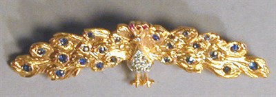 Lot 88 - Diamond and Sapphire Peacock Pin 14 kt. yellow...