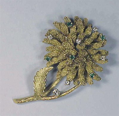 Lot 146 - Diamond and Emerald Flower Pin 18 kt. yellow...