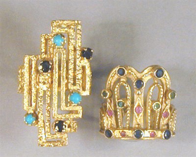 Lot 98 - Two Gold and Multicolored Stone Rings 18 kt....