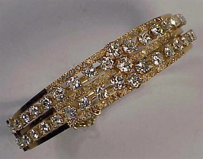 Lot 381 - Gold and Diamond Bangle Bracelet 14 kt. yellow...
