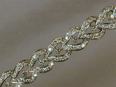 Lot 558 - Diamond Bracelet Platinum and 18 kt. white...