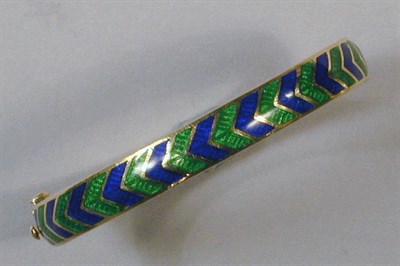 Lot 75 - Gold and Enamel Bangle Bracelet 18 kt. yellow...