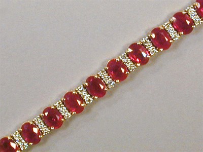 Lot 481 - Ruby and Diamond Bracelet 18 kt. yellow and...