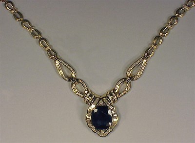 Lot 366 - Diamond and Sapphire Necklace 18 kt. yellow...
