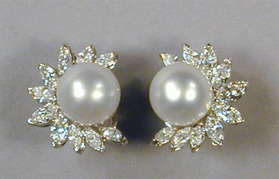 Lot 553 - Pair of Cultured Pearl and Diamond Earrings...