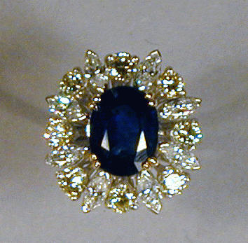 Lot 556 - Sapphire and Diamond Ring Platinum, set to the...