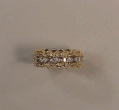 Lot 265 - Gold and Diamond Band 18 kt. yellow gold, the...