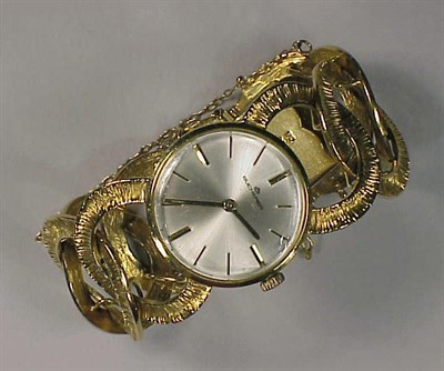 Lot 383 - Lady's Gold Wristwatch 18 kt. yellow gold, the...