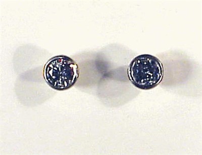Lot 344 - Pair of Diamond Stud Earrings 14 kt. white...