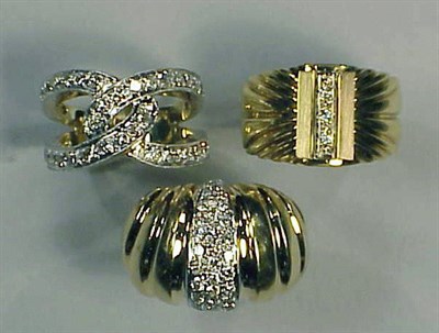 Lot 401 - Three Gold and Diamond Rings 18 kt. yellow...