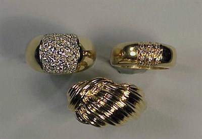 Lot 402 - Three Gold and Diamond Rings 14 kt. yellow...