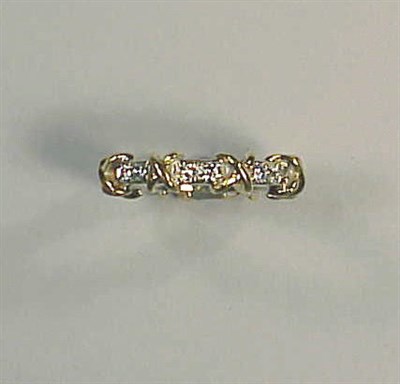 Lot 175 - Diamond Wedding Band 18 kt. yellow and white...