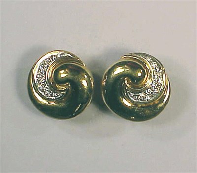 Lot 264 - Pair of Diamond Scroll Earrings 18 kt. yellow...