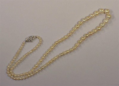 Lot 377 - Natural Pearl Necklace The single strand...