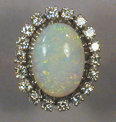 Lot 466 - Opal and Diamond Ring 14 kt. yellow gold, set...