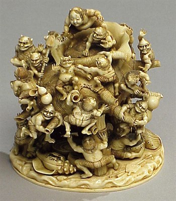 Lot 123 - Elaborate Ivory Group of Oni and a Giant Shell...