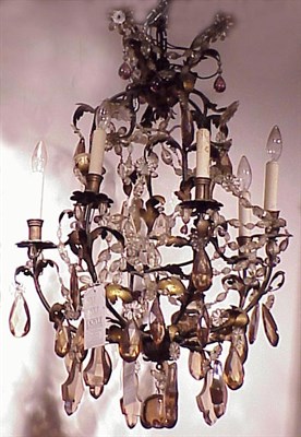 Lot 505 - Rococo Style Six-Light Tin and Amber Glass...