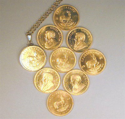 Lot 34 - Nine Gold Krugerrands Each approximately 1...