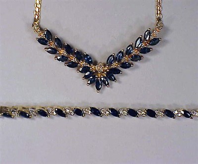 Lot 149 - Suite of Diamond and Sapphire Jewelry 14 kt....
