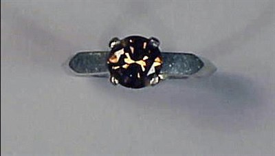 Lot 420 - Fancy Brown Diamond Ring Platinum, centered by...