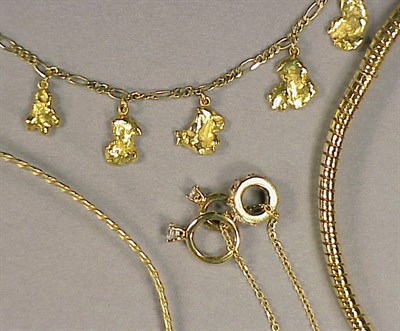 Lot 63 - Four Assorted Gold Necklaces 14 and 18 kt....