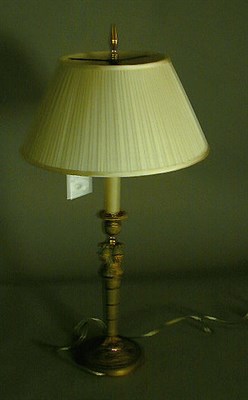 Lot 508 - Empire Style Brass Candlestick The standard...