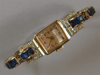 Lot 75A - Lady's Gold and Diamond Wristwatch The 14 kt....