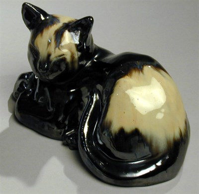 Lot 212 - Fulper Pottery Cat With yellow and gunmetal...