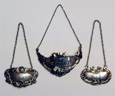 Lot 407 - Group of Sterling Silver Bottle Labels...