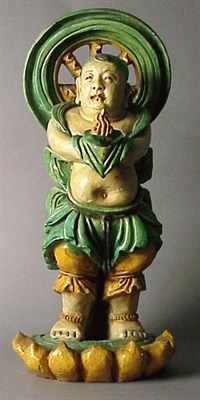 Lot 177 - Three Color Glazed Tilework Figure of a...