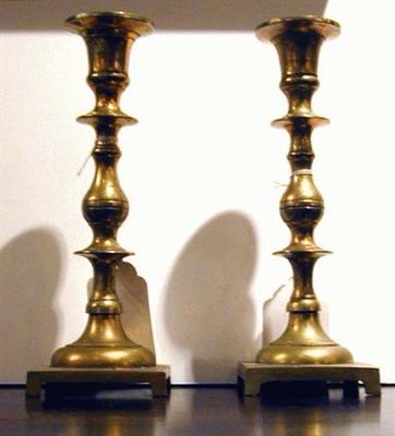 Lot 727 - Pair of Turned Brass Candlesticks