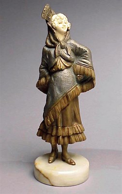 Lot 661 - Bronze and Ivory Figure Depicting a woman in...