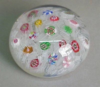 Lot 146 - Two Baccarat Scattered Millefiori Paperweights...